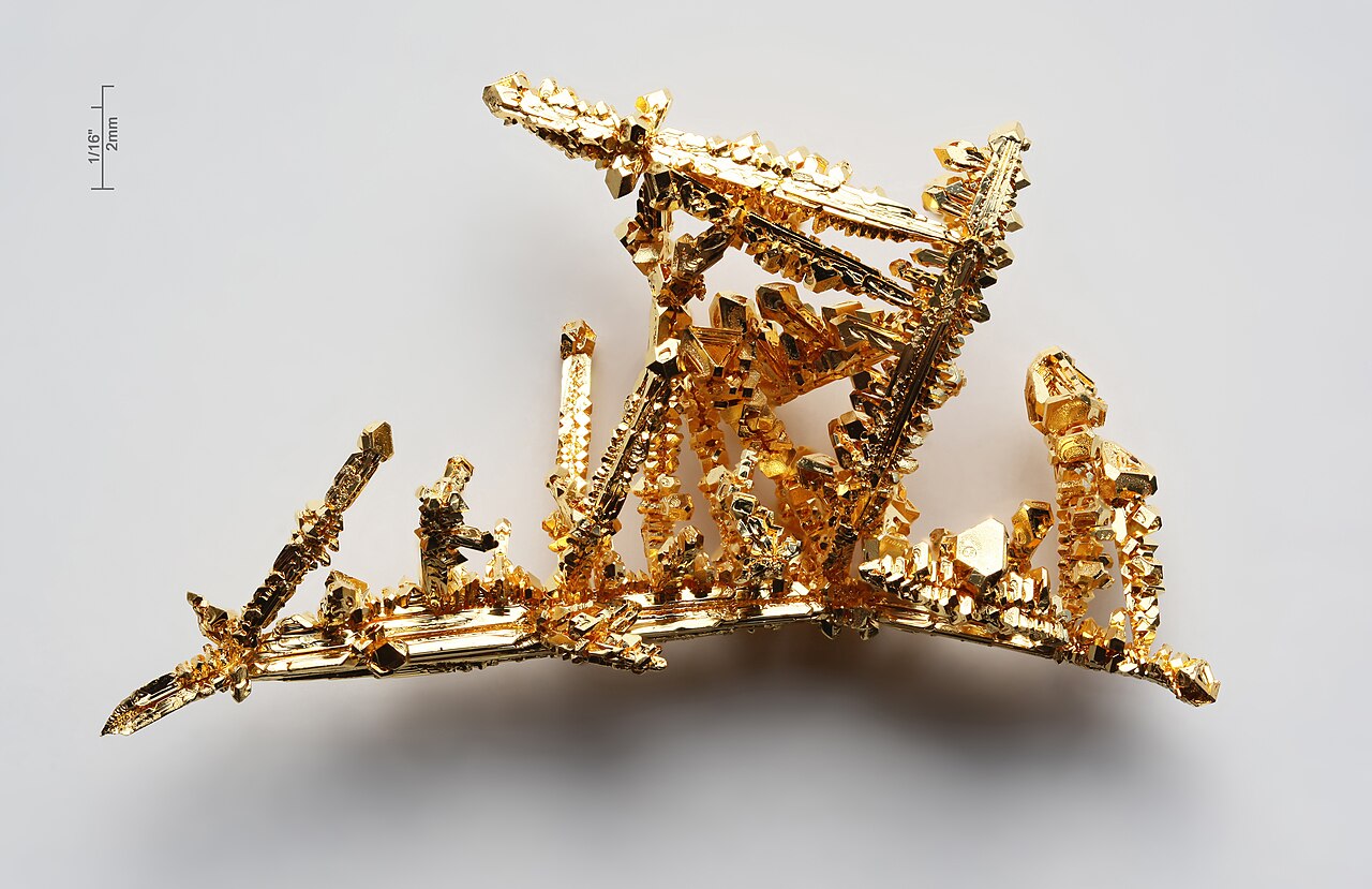 Synthetic made gold crystals by the chemical transport reaction in chlorine gas. Purity >99.99%